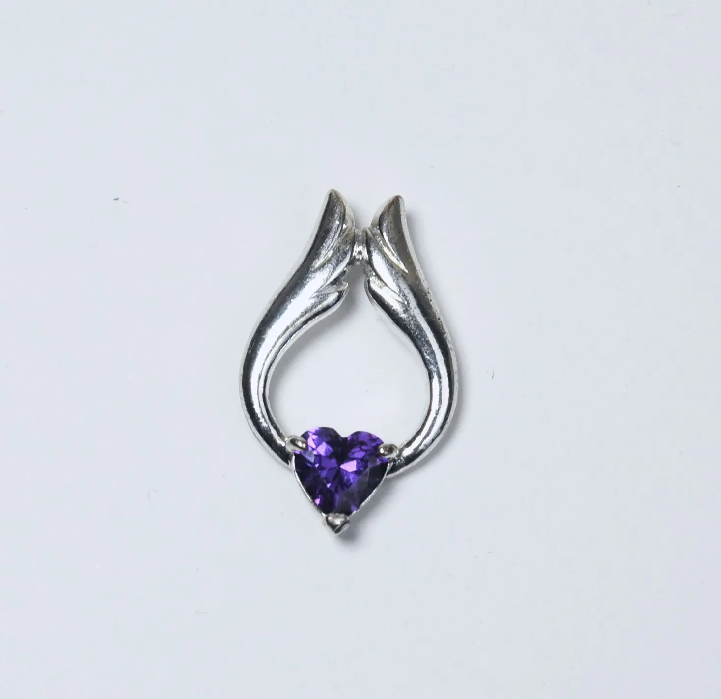 Heart Cut Purple Crystal Winged Silver Pendant