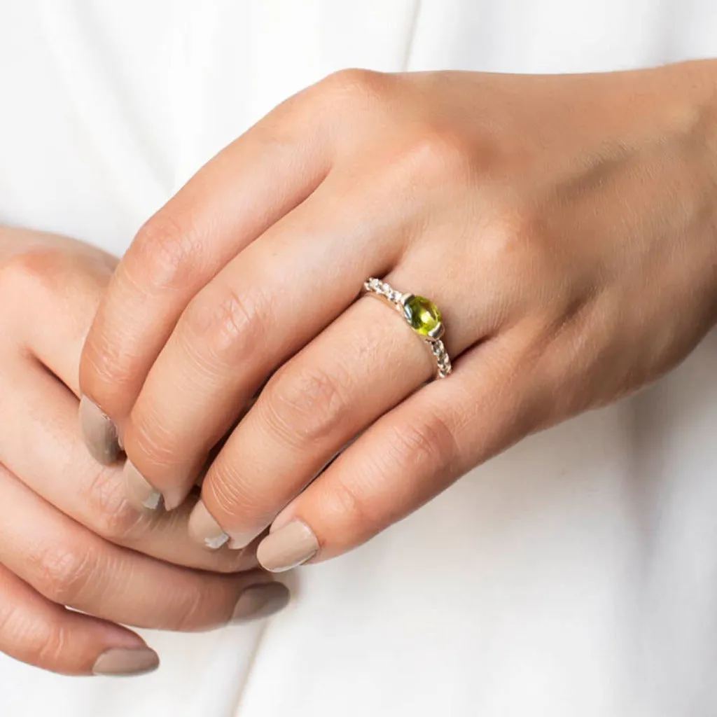 Peridot and White Topaz Ring